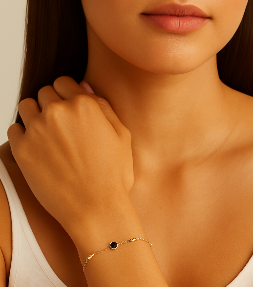 Alternate View of Model Wearing Inaya Mother of Pearl and Onyx Bracelet in 18k Yellow Gold Adjustable Length with Hallmark Stamp 7 inches 1.4gms