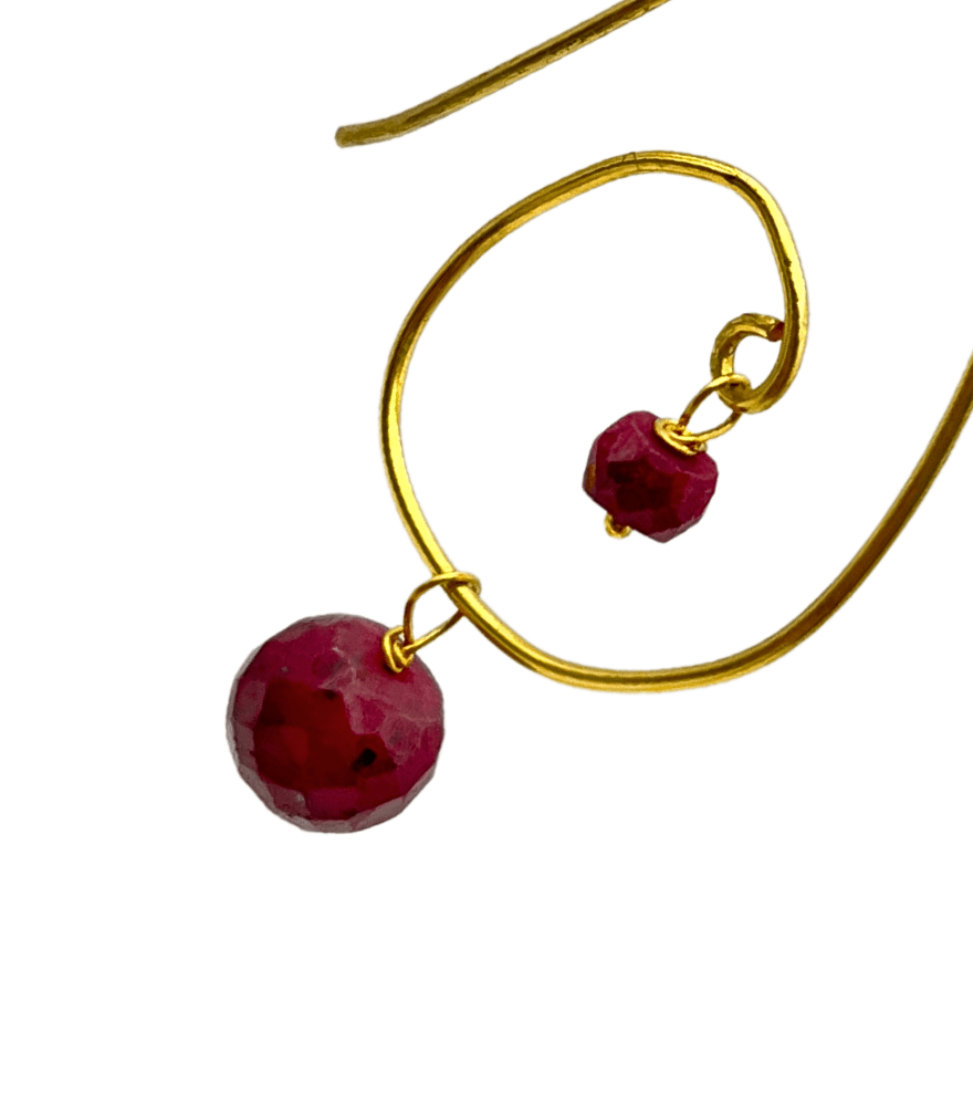 Closeup of Shyla Ruby Spiral Hoops in 18k Gold Jewelry for Pierced Ears Yellow with Hallmark Stamp Metal One Size 4.1gms