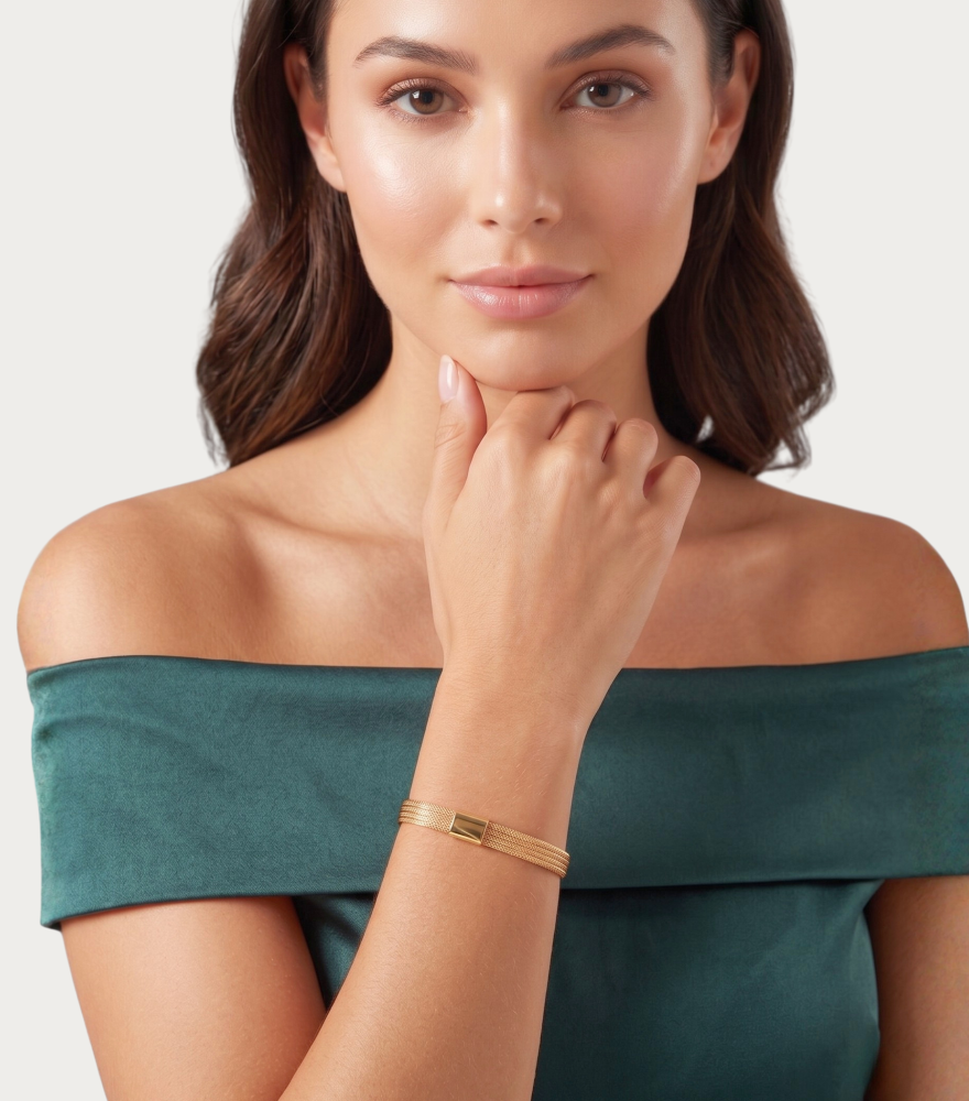 Model Wearing Bettina Stretch-Fit Bracelet in 18k Gold Comfort Fit Yellow with Hallmark Stamp Metal One Size 2.9gms