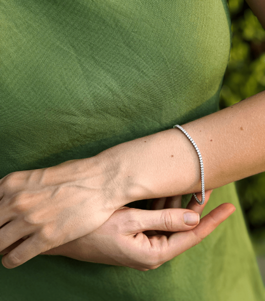 Model Wearing Zoe Tennis Bracelet in 18K White Gold Fixed Length 18k Metal Stone 18 cm 5.5gms Yellow