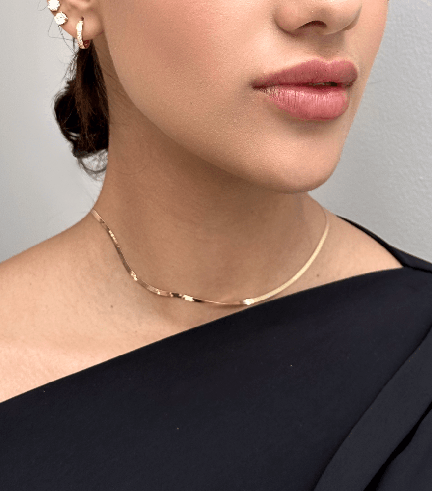 Model Wearing Luxe Herringbone Chain in 18K gold Fixed Length 18k Yellow Gold with Hallmark Stamp Metal One Size 2.7gms