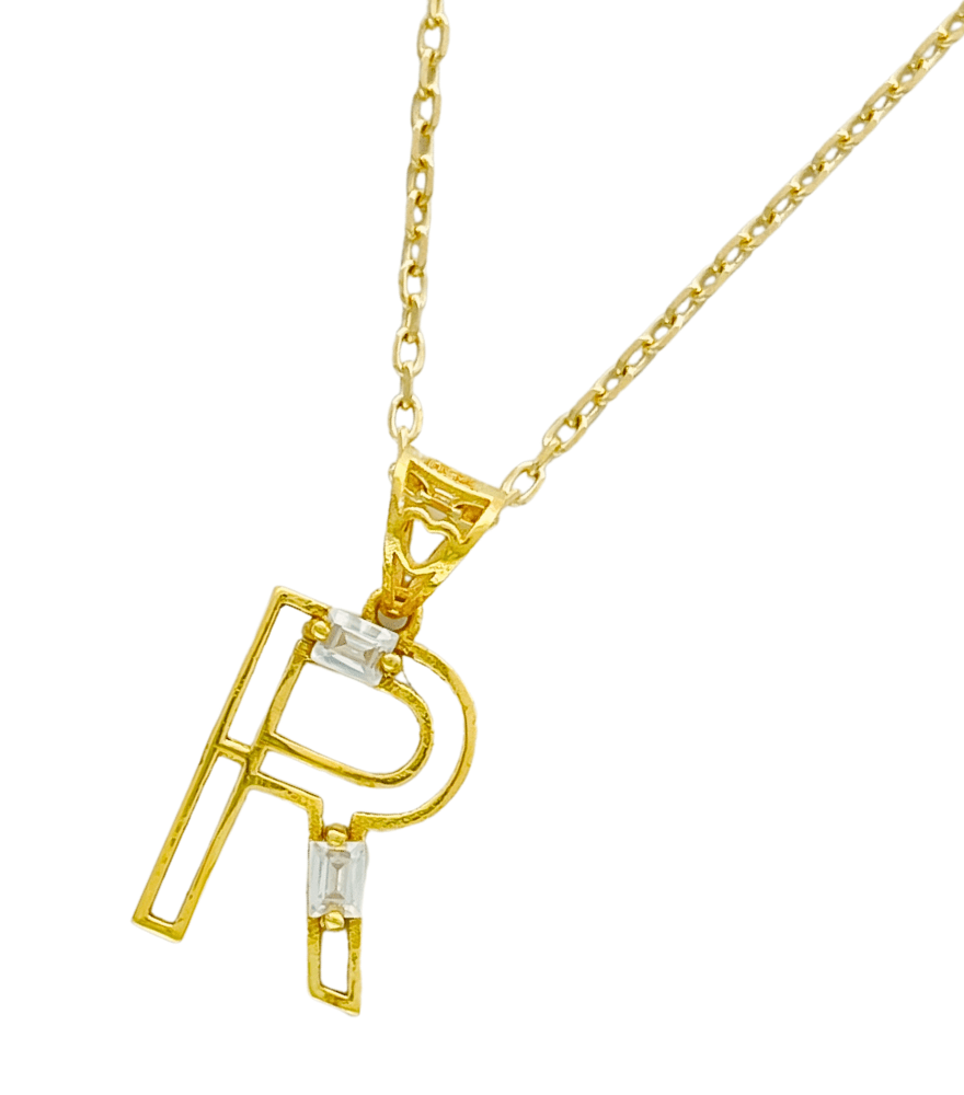 Closeup of Letter 'R' Initials Pendant Necklace in 18k Gold Fixed Length Yellow with Hallmark Stamp Metal One Size 1.3gms