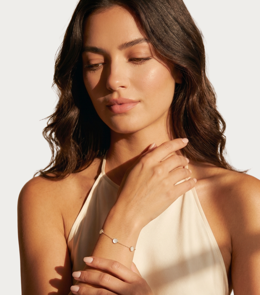 Model Wearing Zira Mother of Pearl Bracelet in 18K Gold Adjustable Length 18k Yellow with Hallmark Stamp One Size 1.1gms