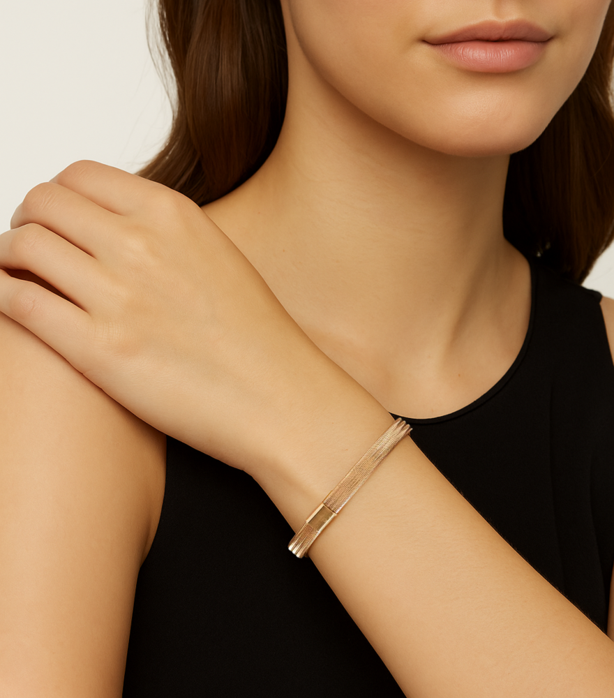 Model Wearing Bettina Stretch-Fit Bracelet in 18k Gold Comfort Fit Yellow with Hallmark Stamp Metal One Size 2.9gms