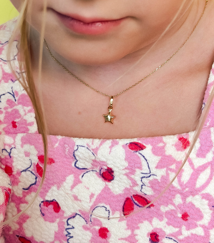 Model Wearing Golden Star charm Pendant Necklace in 18K Gold Fixed Length 18k Yellow with Hallmark Stamp Metal One Size 1.4gms