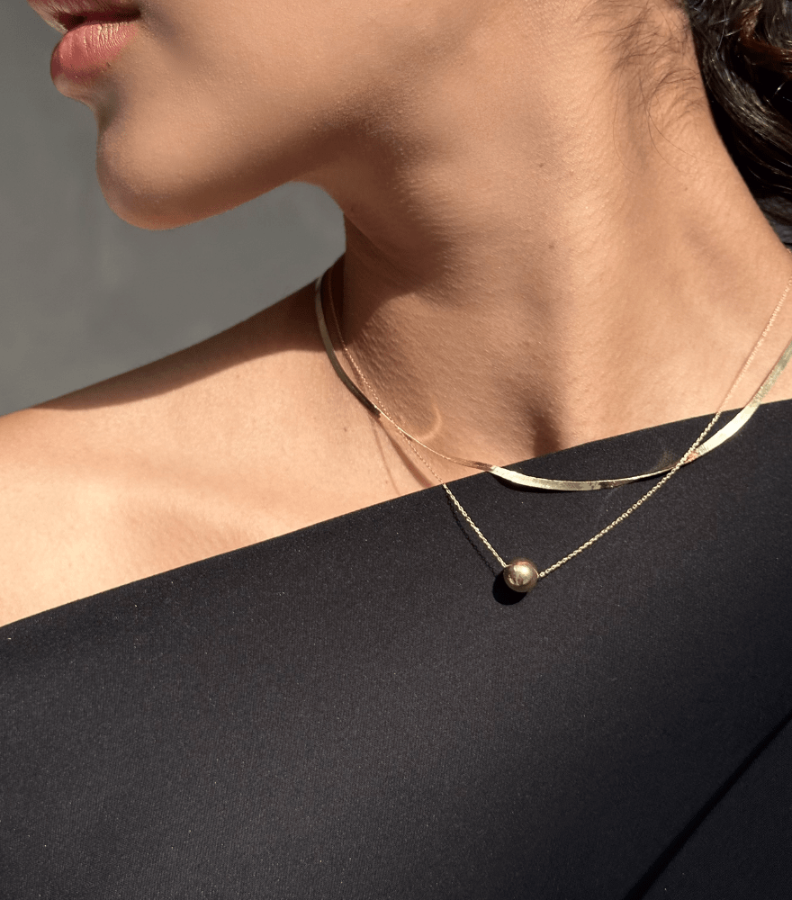 Alternate View of Model Wearing Luxe Herringbone Chain in 18K gold Fixed Length 18k Yellow Gold with Hallmark Stamp Metal One Size 2.7gms