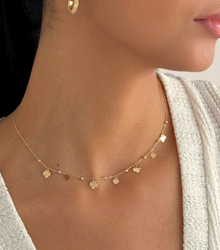Model Wearing Allessia Clover Charm Necklace in 18kt Gold Adjustable Length 18k Yellow with Hallmark Stamp Metal One Size 2gms