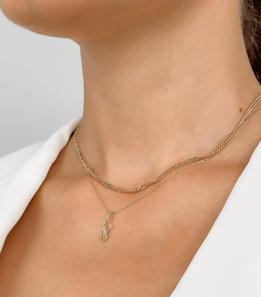 Model Wearing Infinity Pendant Necklace in 18K Gold Fixed Length 18k Yellow with Hallmark Stamp One Size 1.3gms