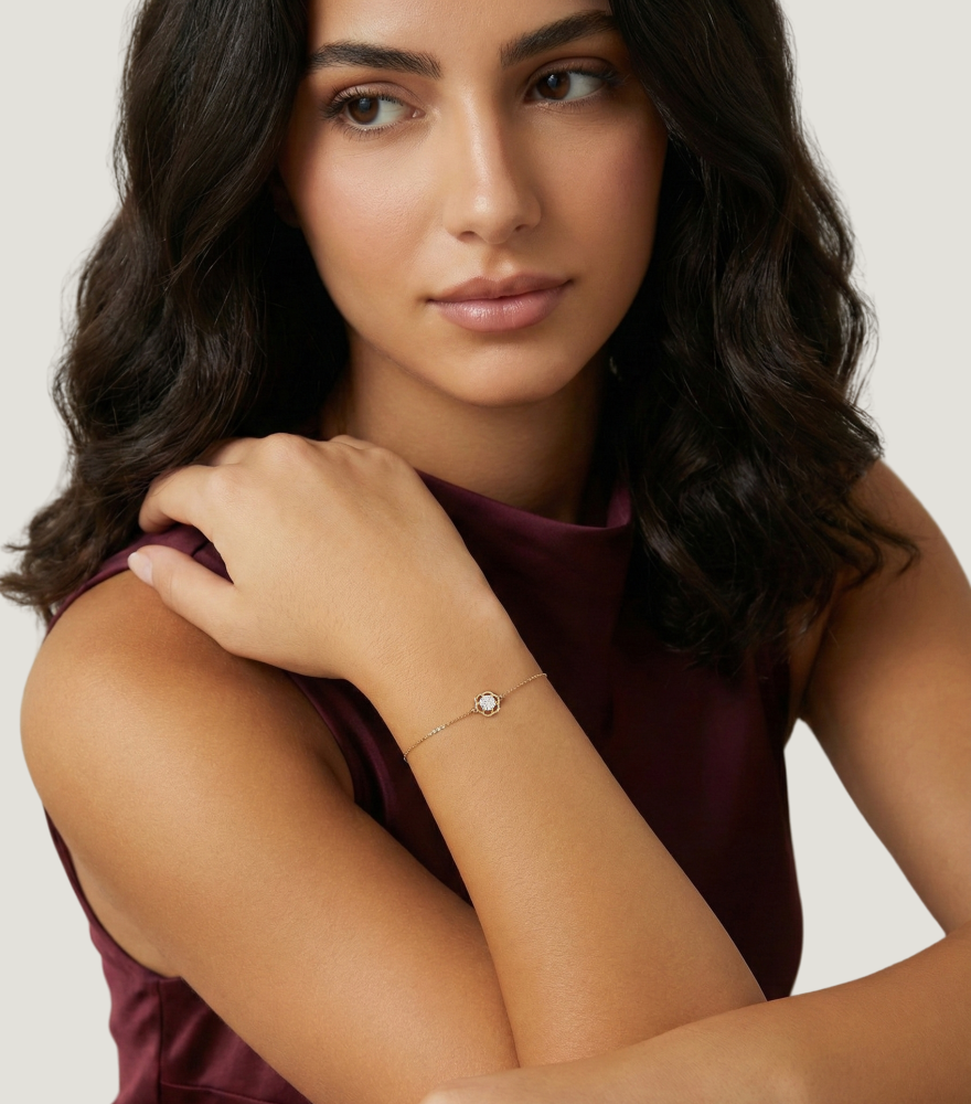 Model Wearing Cosmos bracelet in 18k Gold Comfort Fit Yellow with Hallmark Stamp 7 inches 0.7gms