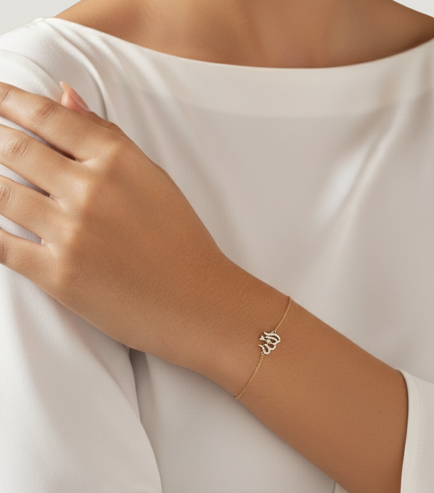 Model Wearing Allah Bracelet in 18K Gold Comfort Fit 18k Yellow with Hallmark Stamp 7 inches 1.1gms