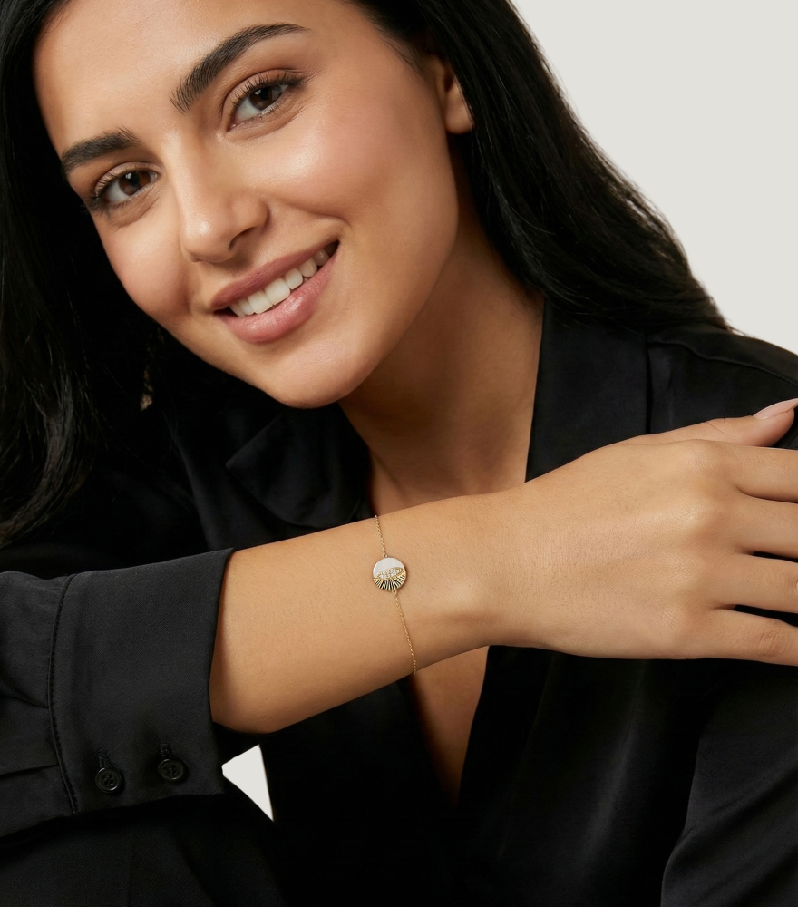 Model Wearing Riva Bracelet in 18k Gold Comfort Fit Yellow with Hallmark Stamp 7 inches 1.1gms