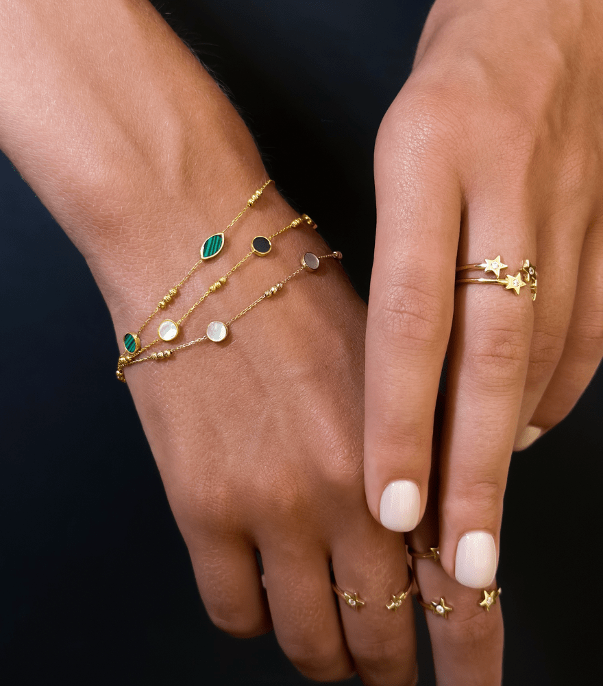 Model Wearing Inaya Mother of Pearl and Onyx Bracelet in 18k Yellow Gold Adjustable Length with Hallmark Stamp 7 inches 1.4gms